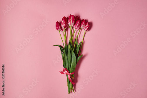 Bouquet of tulips on pink pastel background, copy space. Sping minimal concept. Womens Day, Mothers Day, Valentine's Day, Easter, birthday. Nature background. Flat lay, top view © mirage_studio