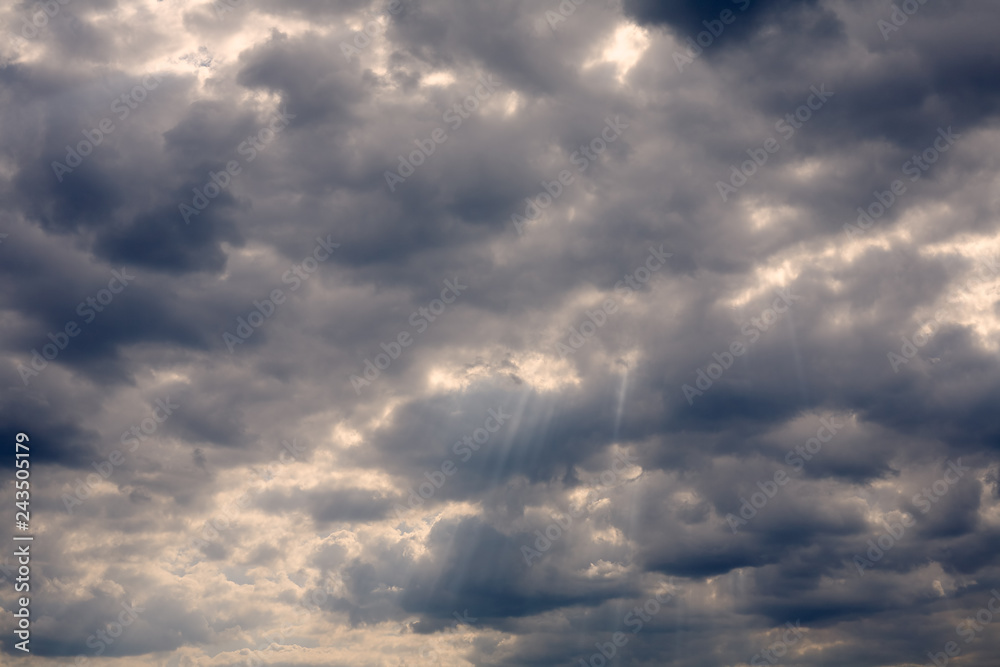 Sunset in the tropical sea. Sun beam through clouds Sunset in the tropical sea. Sun beam through clouds