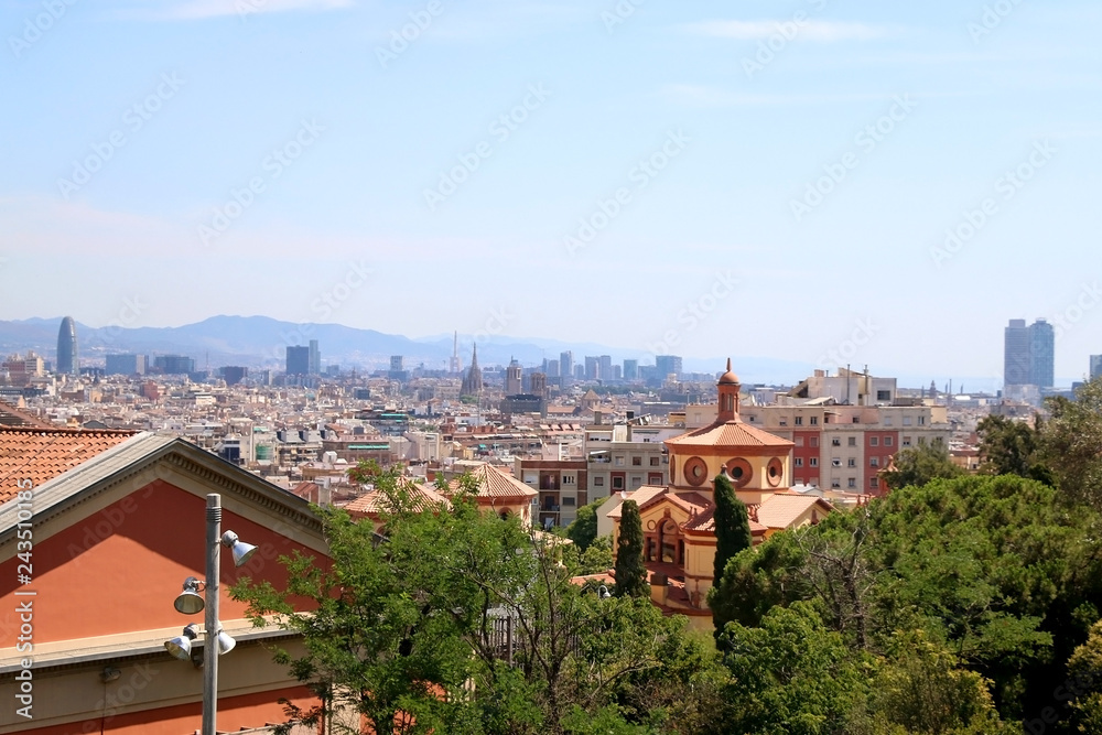 Aerial view of Barcelona, Spain from Montjuïc hill on a sunny day. 
