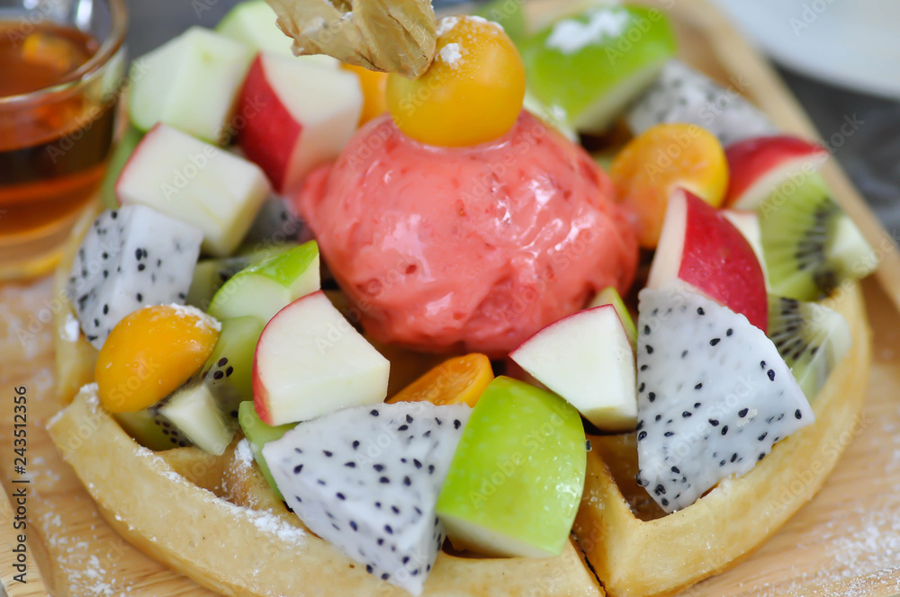 waffle with fruit and ice cream topping waffle with fruit and ice cream topping