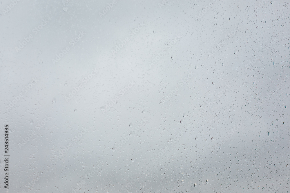 Water drops on the glass. Raindrops on the window in soft focus Water drops on the glass. Raindrops on the window in soft focus