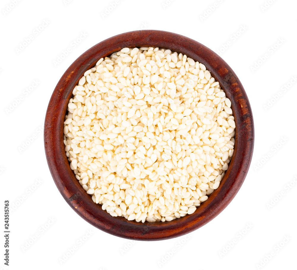 white sesame seed in bowl on white background white sesame seed in bowl on white background
