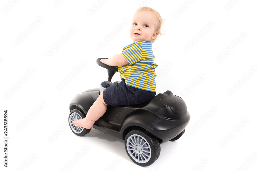 Child sitting on a gurney isolated on white background Child sitting on a gurney isolated on white background