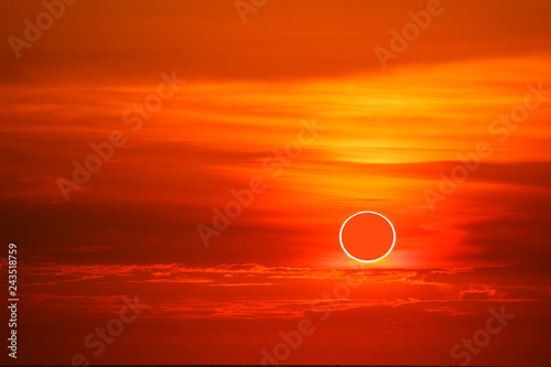 Fototapeta Naklejka Na Ścianę i Meble -  solar eclipses occur in the sky while the sunset times