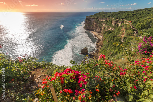 View of Uluwatu cliff with coast and blue ocean in Bali, Indonesia