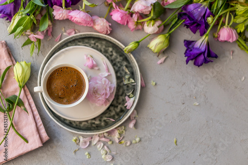 Spring mockup with a cup of coffee and flowers