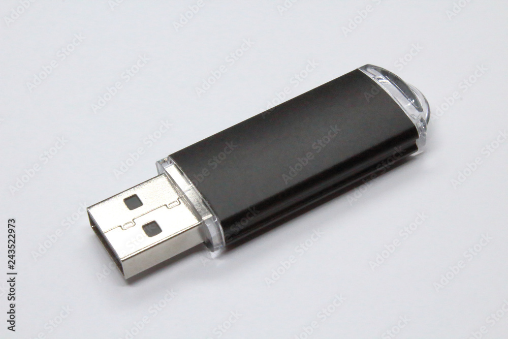 Black USB Flash Drive. Close-up. Isolated object on white background. Isolate. Black USB Flash Drive. Close-up. Isolated object on white background. Isolate.