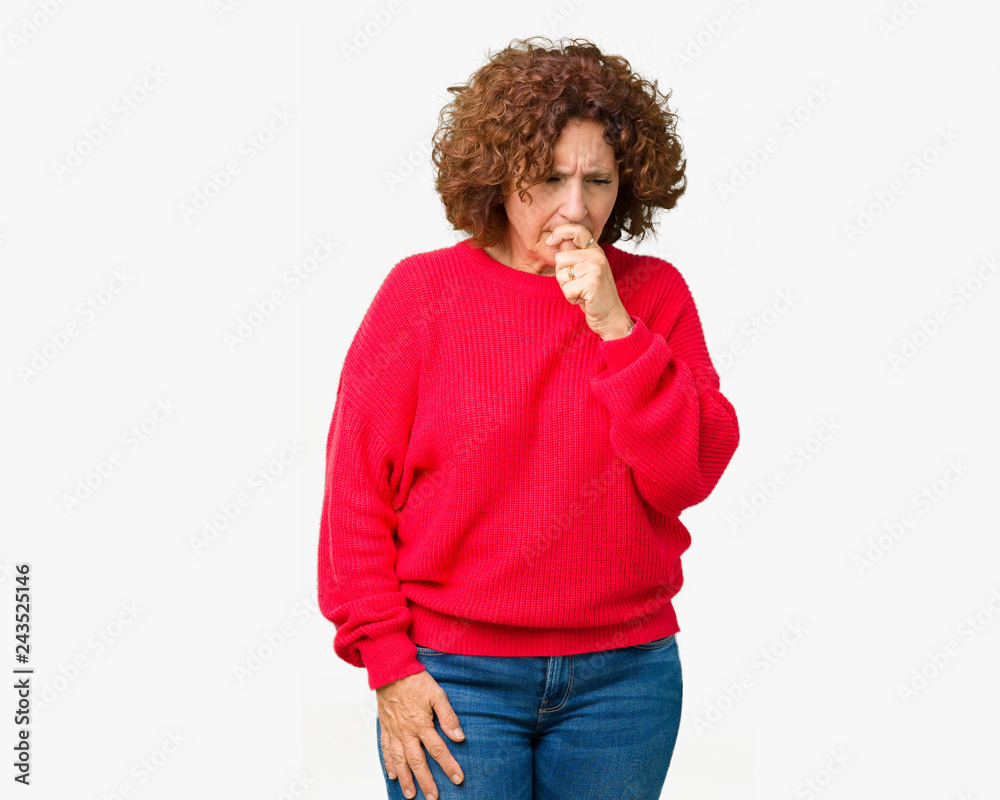 Beautiful middle ager senior woman red winter sweater over isolated background feeling unwell and coughing as symptom for cold or bronchitis. Healthcare concept. Beautiful middle ager senior woman red winter sweater over isolated background feeling unwell and coughing as symptom for cold or bronchitis. Healthcare concept.