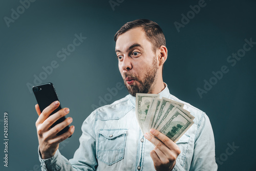 Man celebrating victory after making bets at bookmaker website