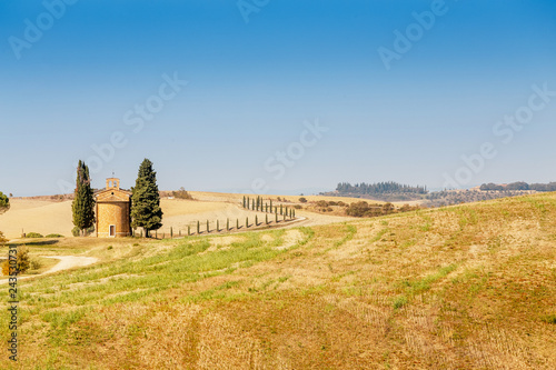 Scenic landscape with old chapel in Tuscany, Italy at autumn