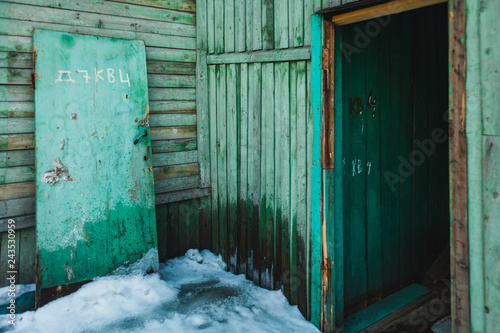 a porch of an old wooden house in spring in Siberia © wundermann