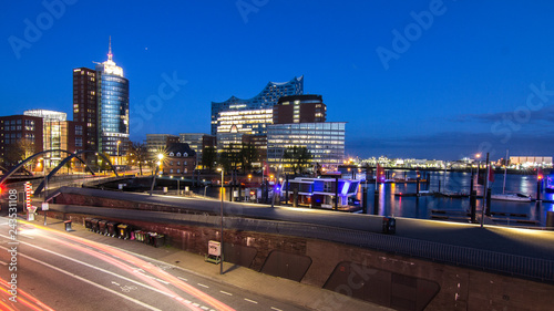 Elbphilharmonie und Coloumbus Tower am Abend photo