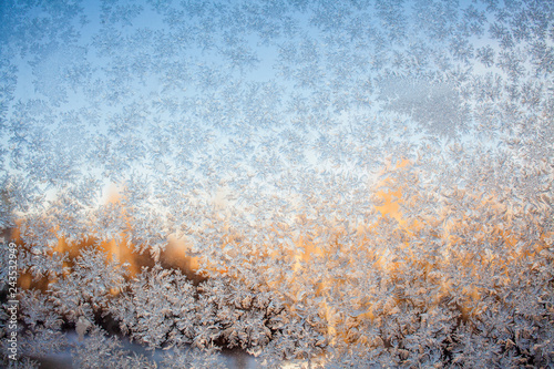 frost texture on the window glass in winter © wundermann