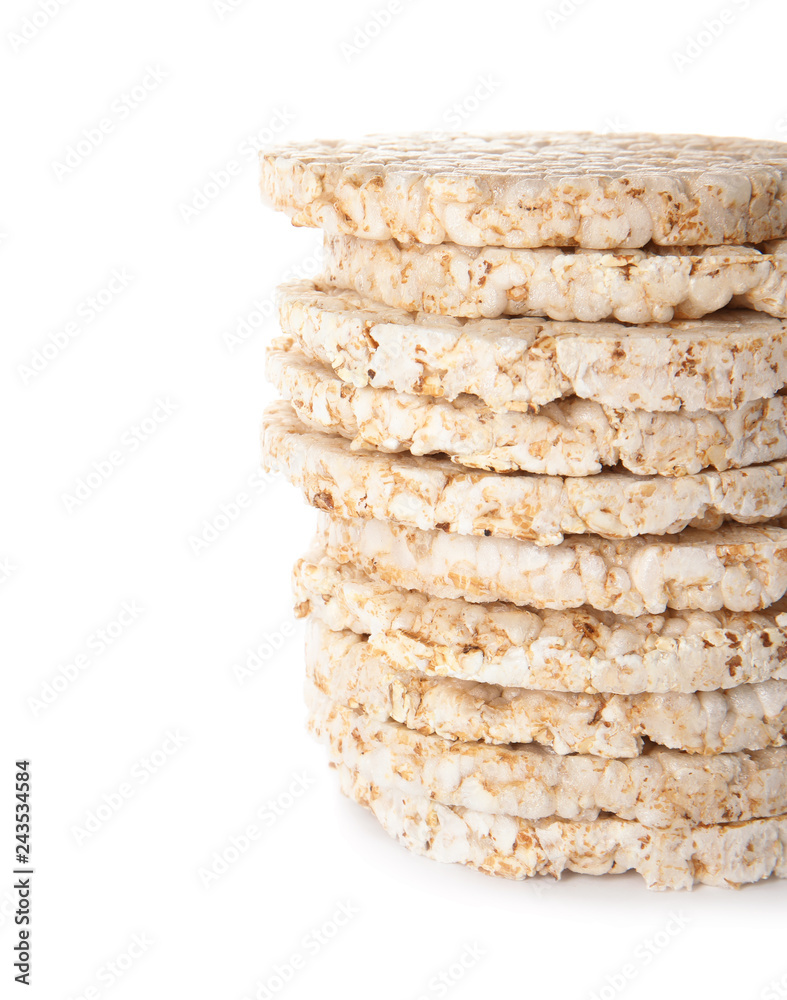 Stack of crunchy rice cakes on white background