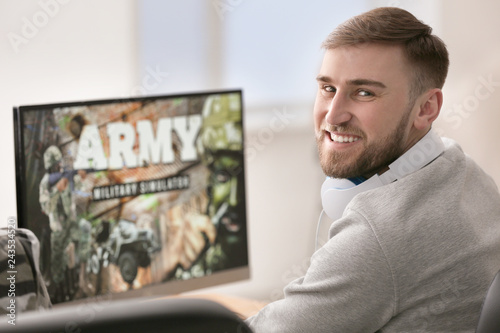 Young man playing video gam...