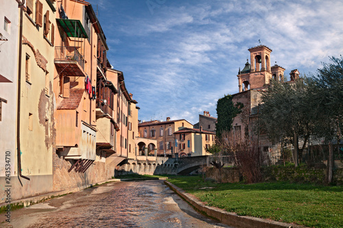 Modigliana, Forli-Cesena, Emilia-Romagna, Italy: the old town with the canal and the ancient houses photo