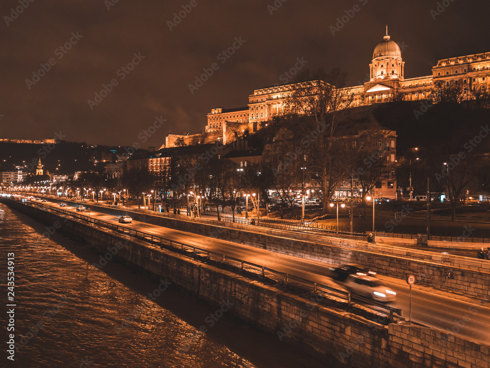 Budapest city by night in Hungary, street on Danube river on the Buda Castle side, view towards the castle