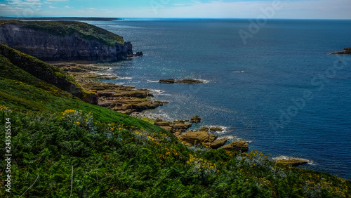 View of the coast in sunshine in Brittany at Cape Frehel in France