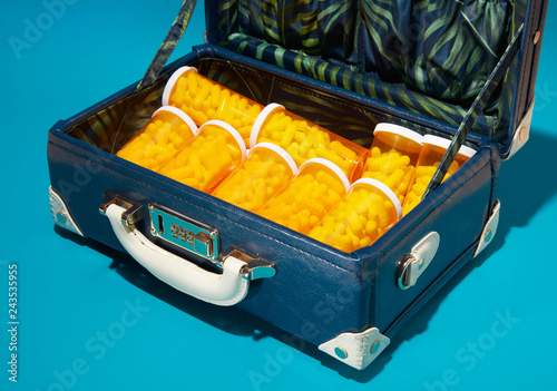 Close up of pill bottles in suitcase