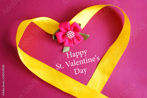 Happy valentine's day card. Yellow ribbon heart on a pink background.