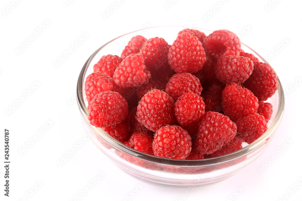 raspberry in bowl isolated on white background raspberry in bowl isolated on white background