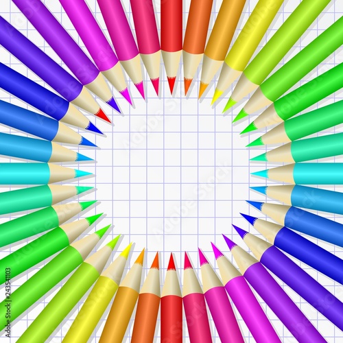 colorful crayons on checkered sheet