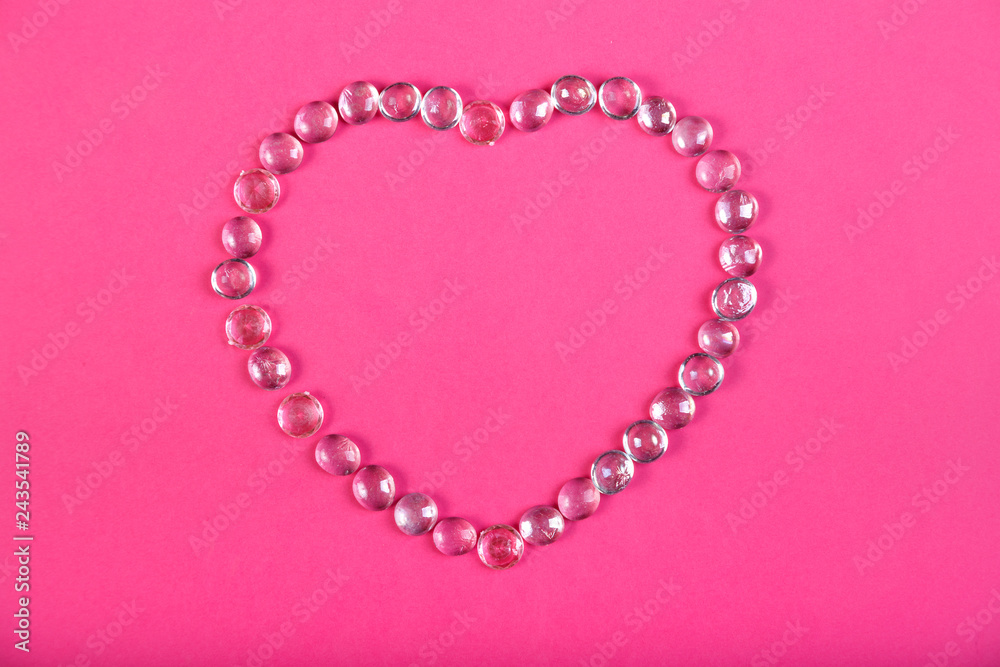 Beaded heart on a pink background horizontal