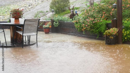 Flooding in backyard after heavy rain came in after the fires her in California last year. photo