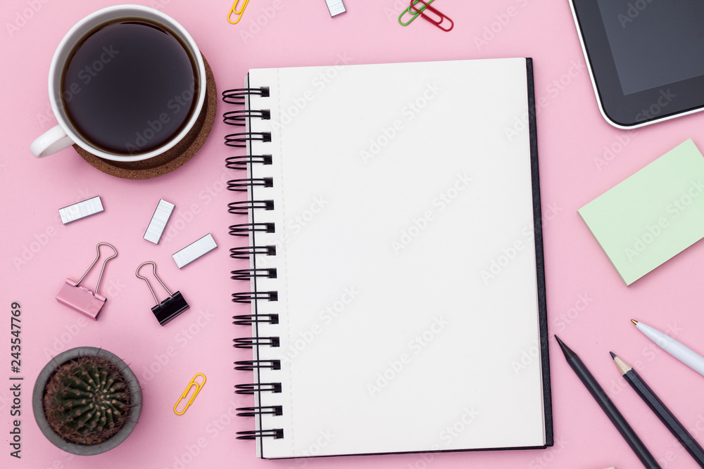 Top view workspace mockup on pink background with notebook, cactus, pen, pencil, cup of coffee, clips and accessories. Mockup Top view workspace mockup on pink background with notebook, cactus, pen, pencil, cup of coffee, clips and accessories. Mockup
