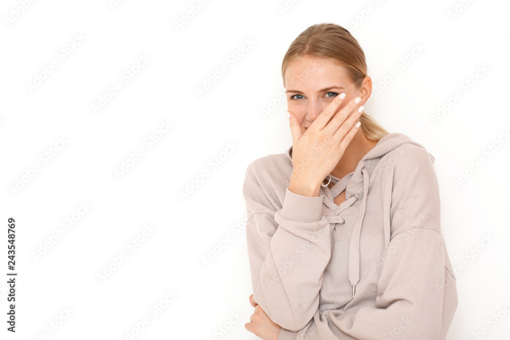 Portrait of laughing happy female model in white background. Portrait of laughing happy female model in white background.