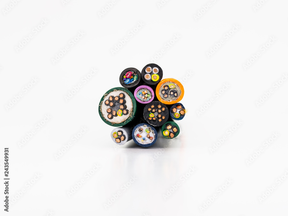 Cross-section of various electric cables, isolated on a white background with a clipping path. Cross-section of various electric cables, isolated on a white background with a clipping path.