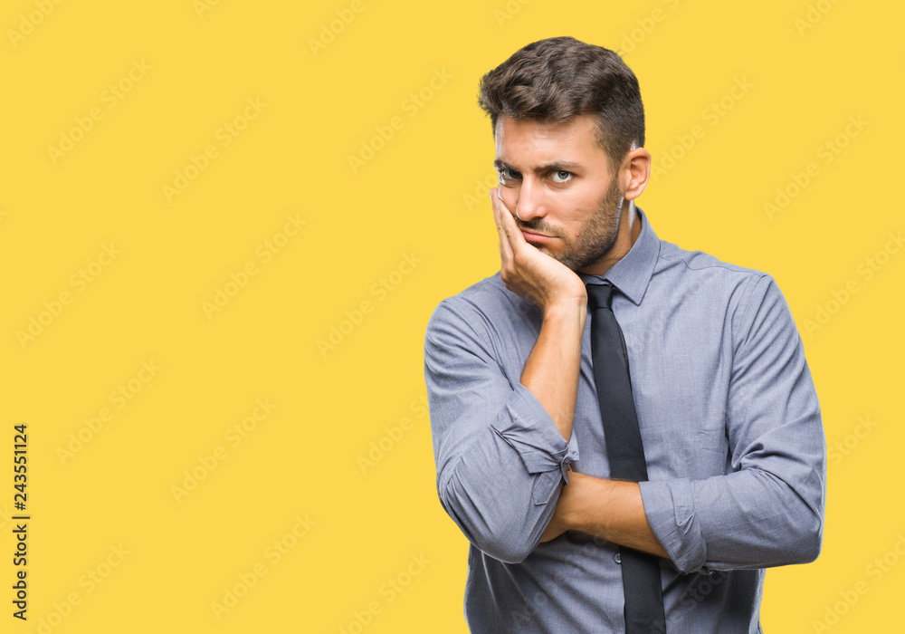 Young handsome business man over isolated background thinking looking tired and bored with depression problems with crossed arms. Young handsome business man over isolated background thinking looking tired and bored with depression problems with crossed arms.