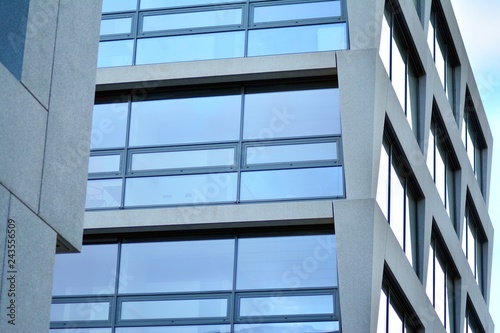 Abstract fragment of modern architecture, walls made of glass and concrete.