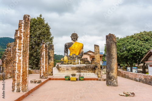 Buddha in the ruined temple of Piawat. Laos. photo