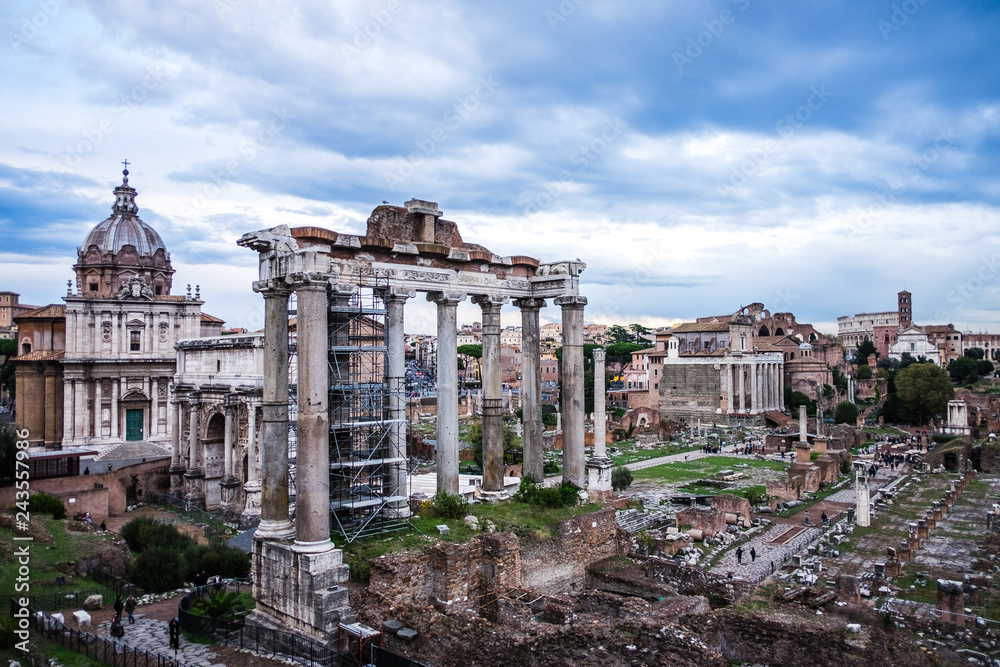 Roman Forum with cloudy sky. Italy antique