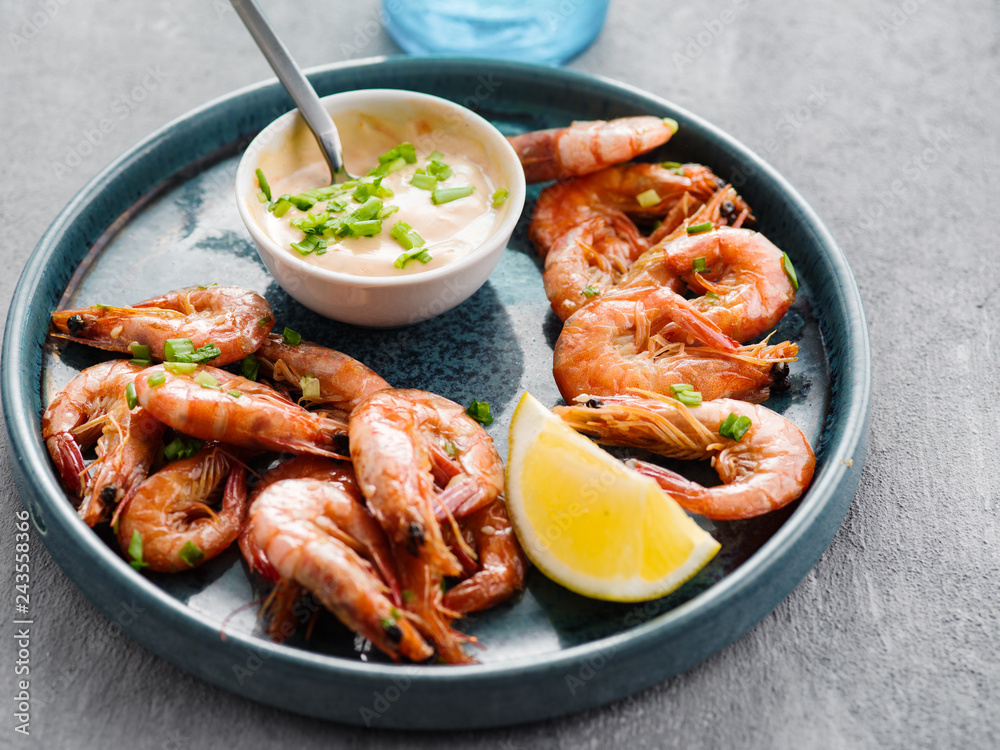 Shrimp glazed in soy sauce with green onion and lemon. Shrimp glazed in soy sauce with green onion and lemon.