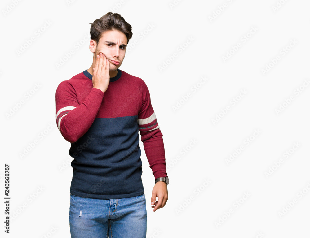 Young handsome man over isolated background touching mouth with hand with painful expression because of toothache or dental illness on teeth. Dentist concept. Young handsome man over isolated background touching mouth with hand with painful expression because of toothache or dental illness on teeth. Dentist concept.
