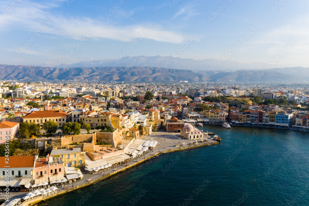 Panoramic aerial view from above of the city of Chania, Crete island, Greece. Landmarks of Greece, beautiful venetian town Chania in Crete island.