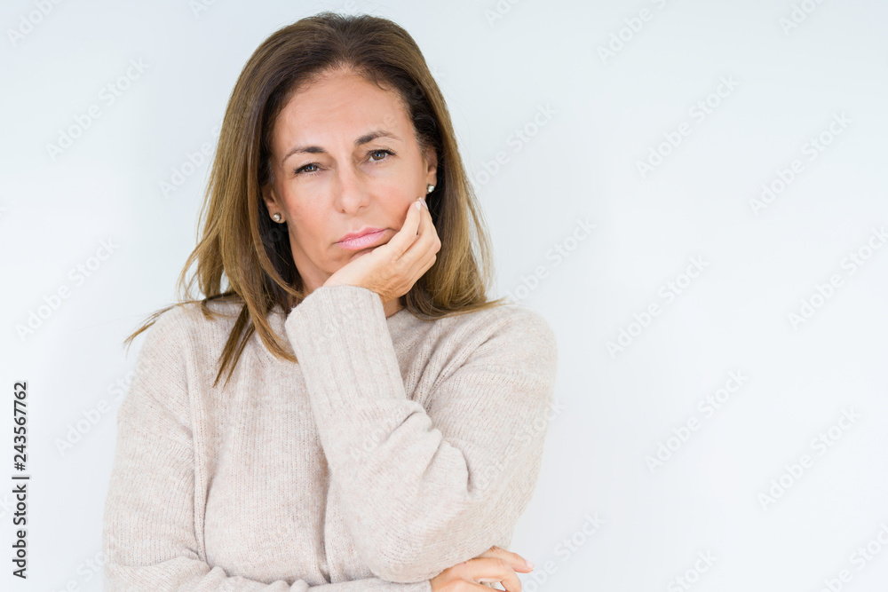 Beautiful middle age woman over isolated background thinking looking tired and bored with depression problems with crossed arms. Beautiful middle age woman over isolated background thinking looking tired and bored with depression problems with crossed arms.
