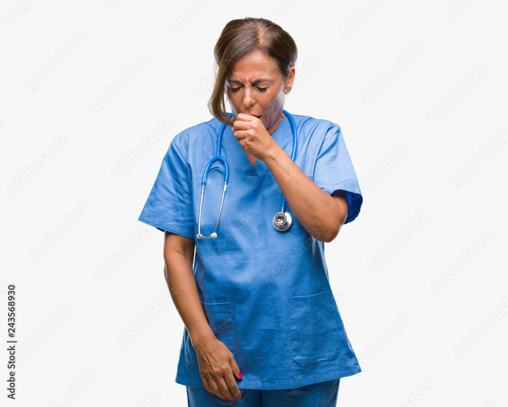 Middle age senior nurse doctor woman over isolated background feeling unwell and coughing as symptom for cold or bronchitis. Healthcare concept. Middle age senior nurse doctor woman over isolated background feeling unwell and coughing as symptom for cold or bronchitis. Healthcare concept.