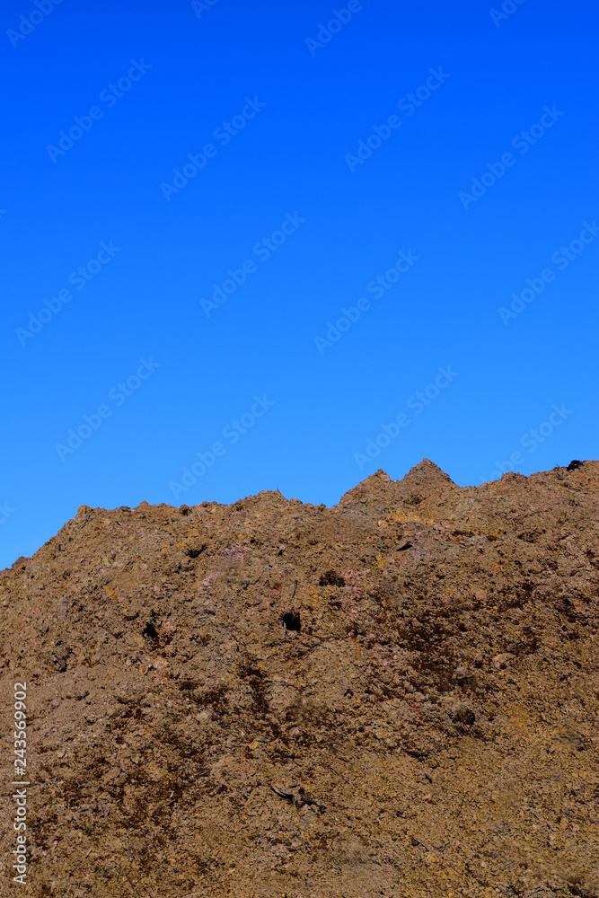 Fresh Clean Topsoil Dirt Hill for Organic Gardening and Landscaping Blue Sky Type Area Fresh Clean Topsoil Dirt Hill for Organic Gardening and Landscaping Blue Sky Type Area