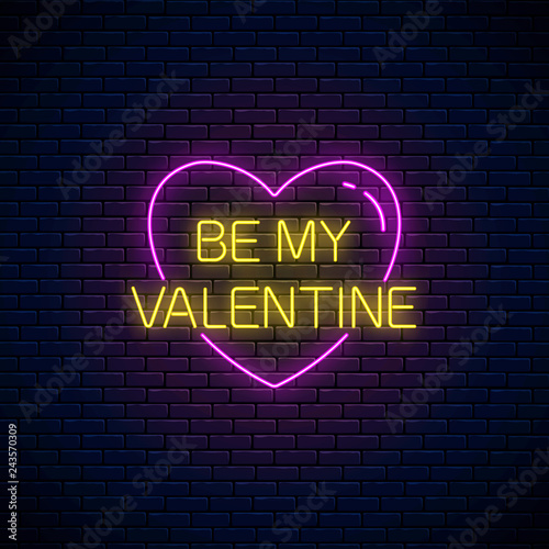 Be my Valentine text in heart shape in neon style. Happy Valentines Day neon glowing sign. Holiday greeting card