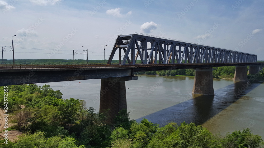 The Anghel Saligny Bridge (formerly King Carol I Bridge) spans the Danube near Cernavoda, Romania. may , 2017 The Anghel Saligny Bridge (formerly King Carol I Bridge) spans the Danube near Cernavoda, Romania. may , 2017