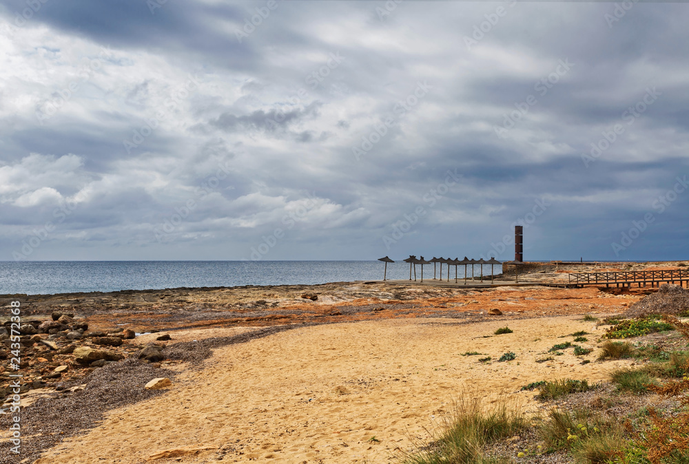 Playa Sa Bassa des Cabots in gloomy weather. Colonia Sant Jordi. Mallorca island