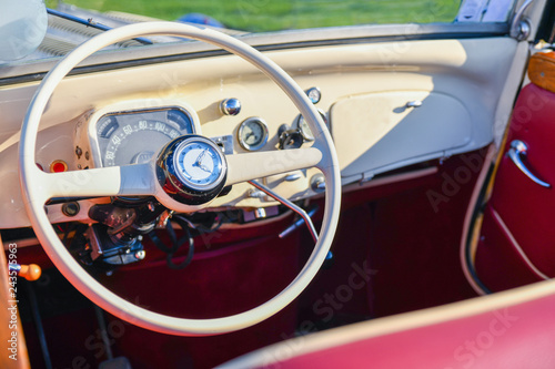 Vintage retro car interior with wheel and dashboard © o1559kip