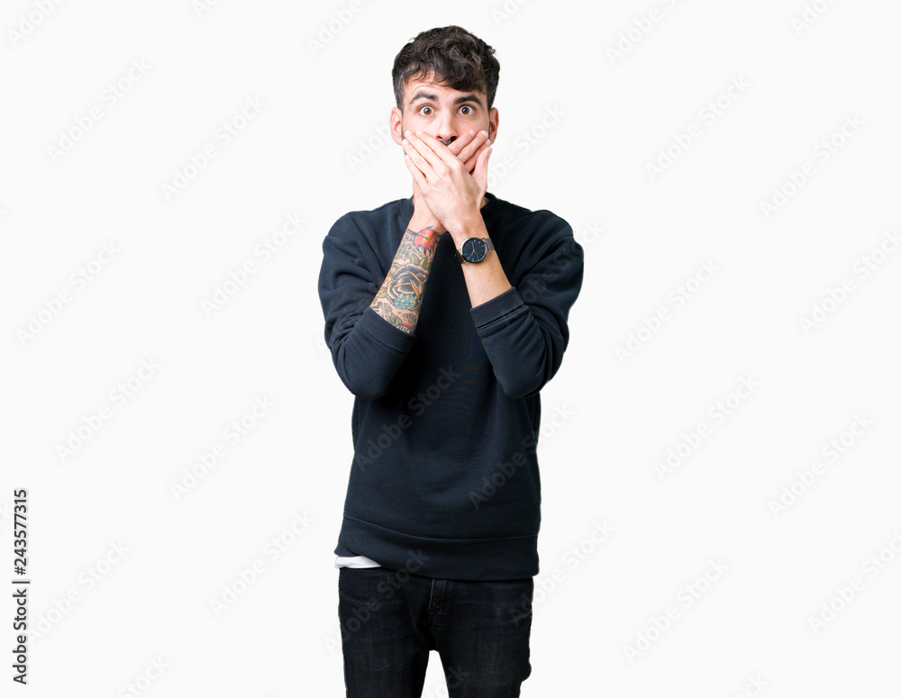 Young handsome man over isolated background shocked covering mouth with hands for mistake. Secret concept. Young handsome man over isolated background shocked covering mouth with hands for mistake. Secret concept.
