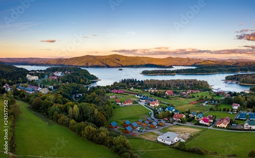 Fototapeta Naklejka Na Ścianę i Meble -  Sunset over Solina lake and Polanczyk village in Bieszczady mountains