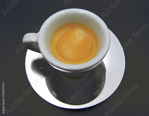 White coffee cup on dark table, italian espresso