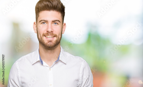 Young handsome business man with a happy and cool smile on face. Lucky person. © Krakenimages.com