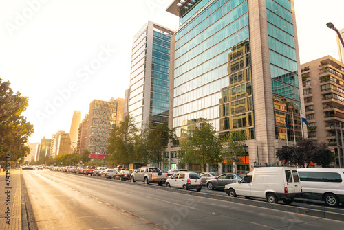 Apoquindo Avenue and modern buildings of Las Condes neighborhood at sunset - Santiago, Chile photo